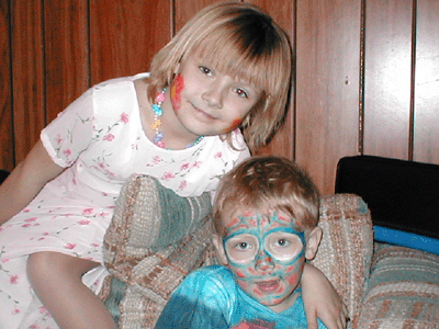 Amanda & Steven with their faces painted on March 24, 2002